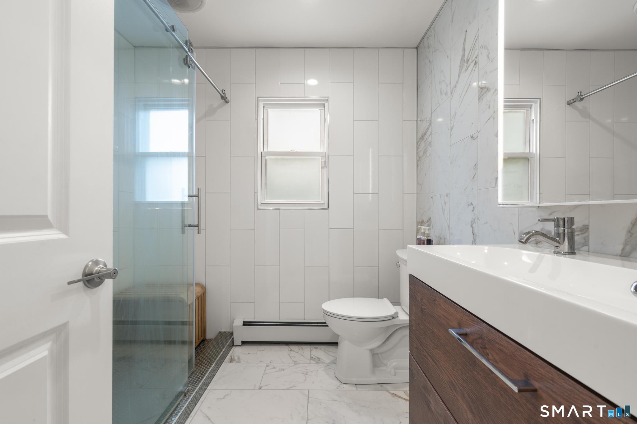 141 Rood Avenue Windsor, CT 06095 - Photo 13 of 37 1ST FLOOR - FULL BATHROOM W/ STAND UP SHOWER