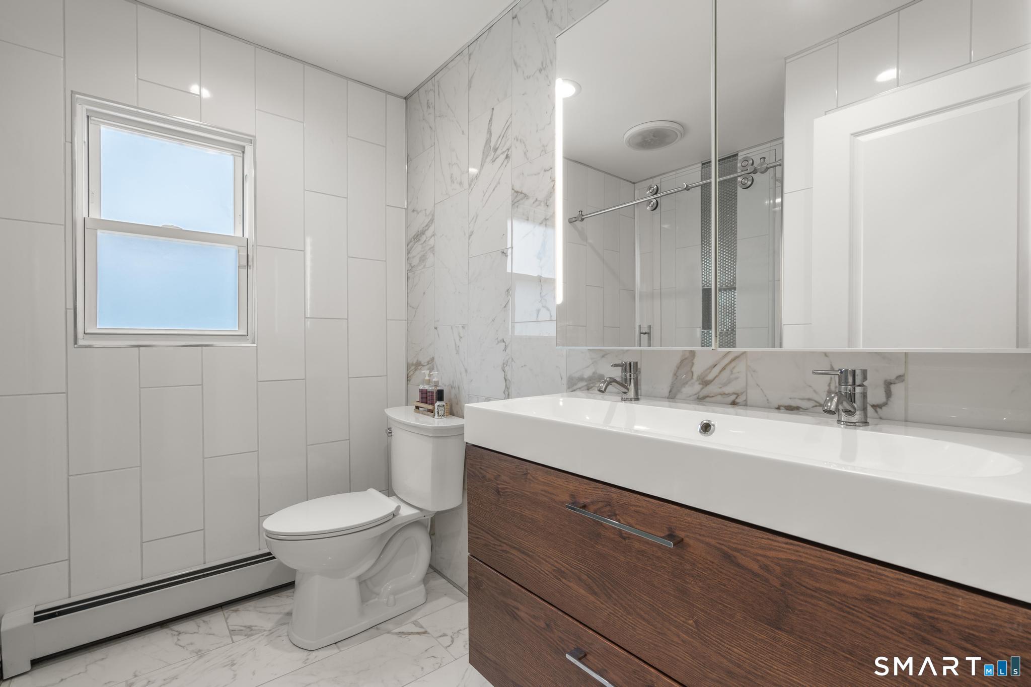 141 Rood Avenue Windsor, CT 06095 - Photo 14 of 37 1ST FLOOR - FULL BATHROOM W/ STAND UP SHOWER