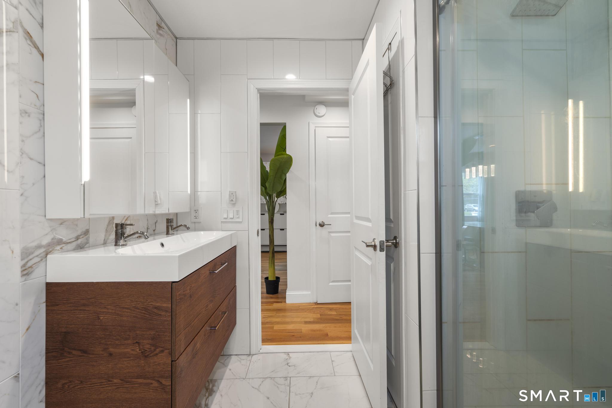 141 Rood Avenue Windsor, CT 06095 - Photo 16 of 37 1ST FLOOR - FULL BATHROOM W/ STAND UP SHOWER