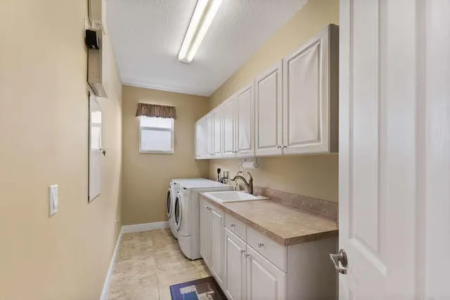 a bedroom with furniture and a ceiling fan