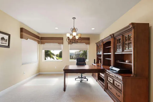 a view of a balcony with furniture