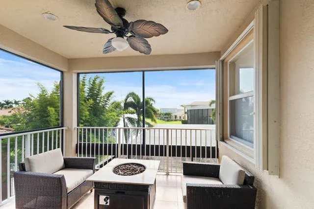 a bathroom with a tub a sink and mirror