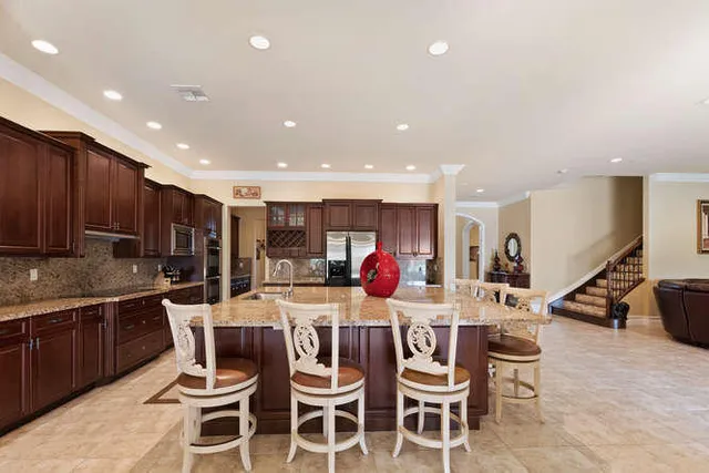 a view of a dining room with furniture window and outside view