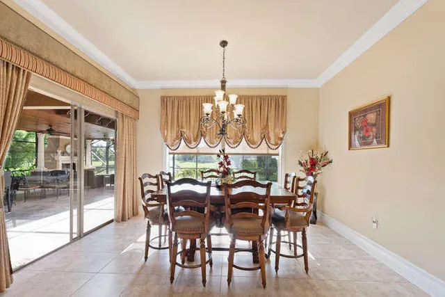 a room with a table and chairs