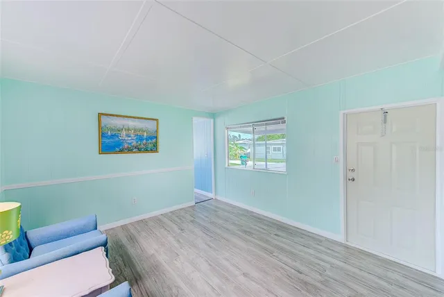 a room with a bed and a chair