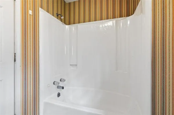 a bathroom with a bathtub