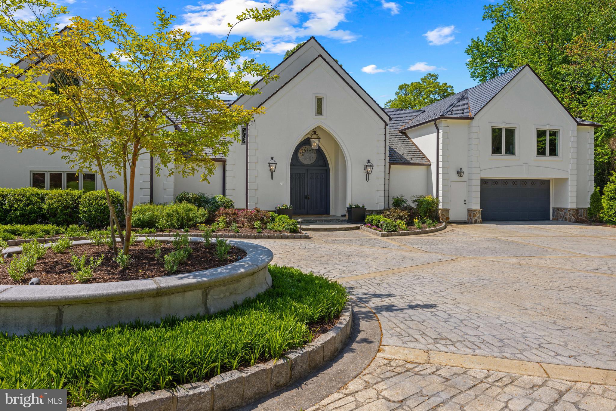 1524 Cedar Lane Farm Road Annapolis, MD 21409 - Photo 12 of 50 a front view of a house with a yard and potted plants