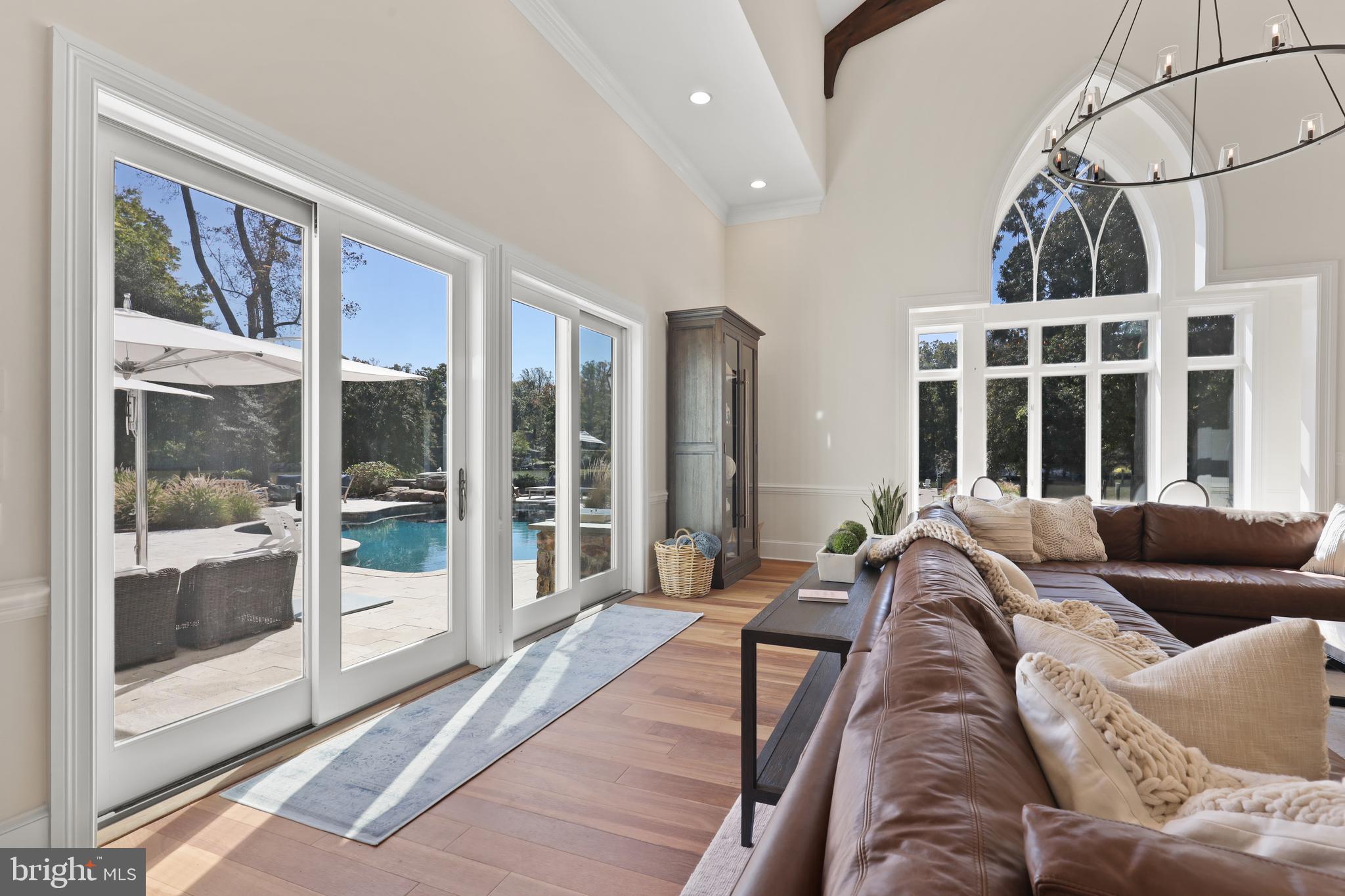 1524 Cedar Lane Farm Road Annapolis, MD 21409 - Photo 16 of 50 a living room with furniture and large windows