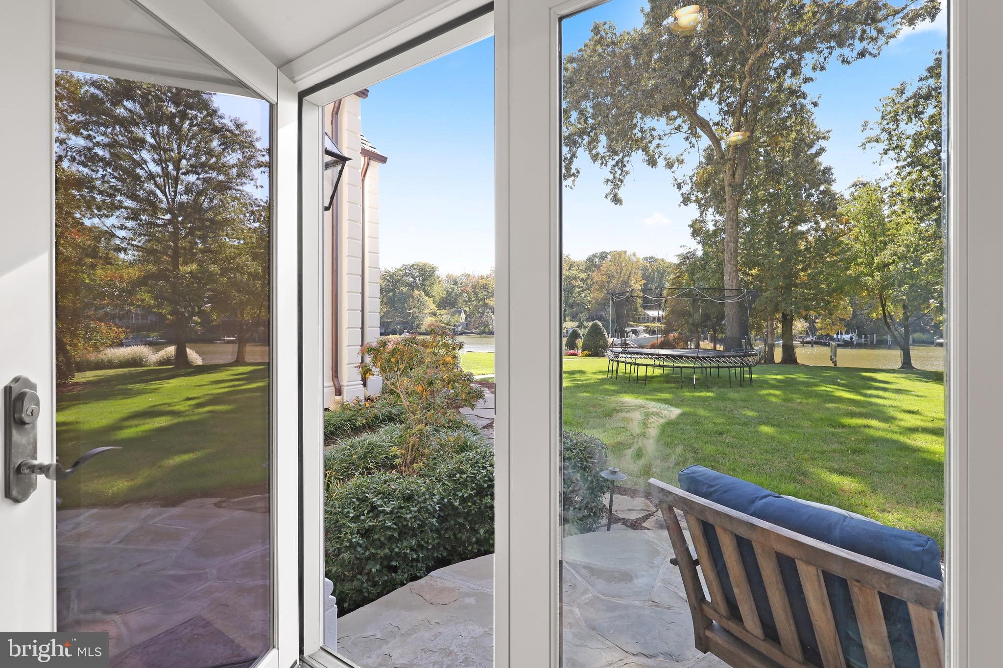 1524 Cedar Lane Farm Road Annapolis, MD 21409 - Photo 31 of 50 a view of a porch with a big yard and potted plants