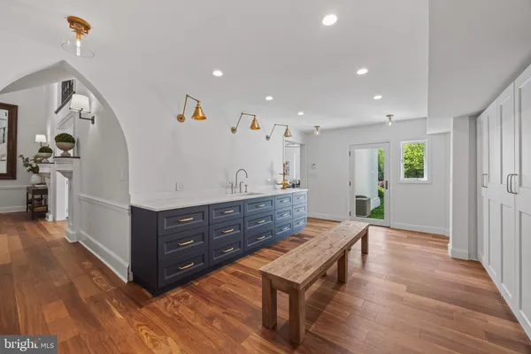 a room with furniture and a wooden floor