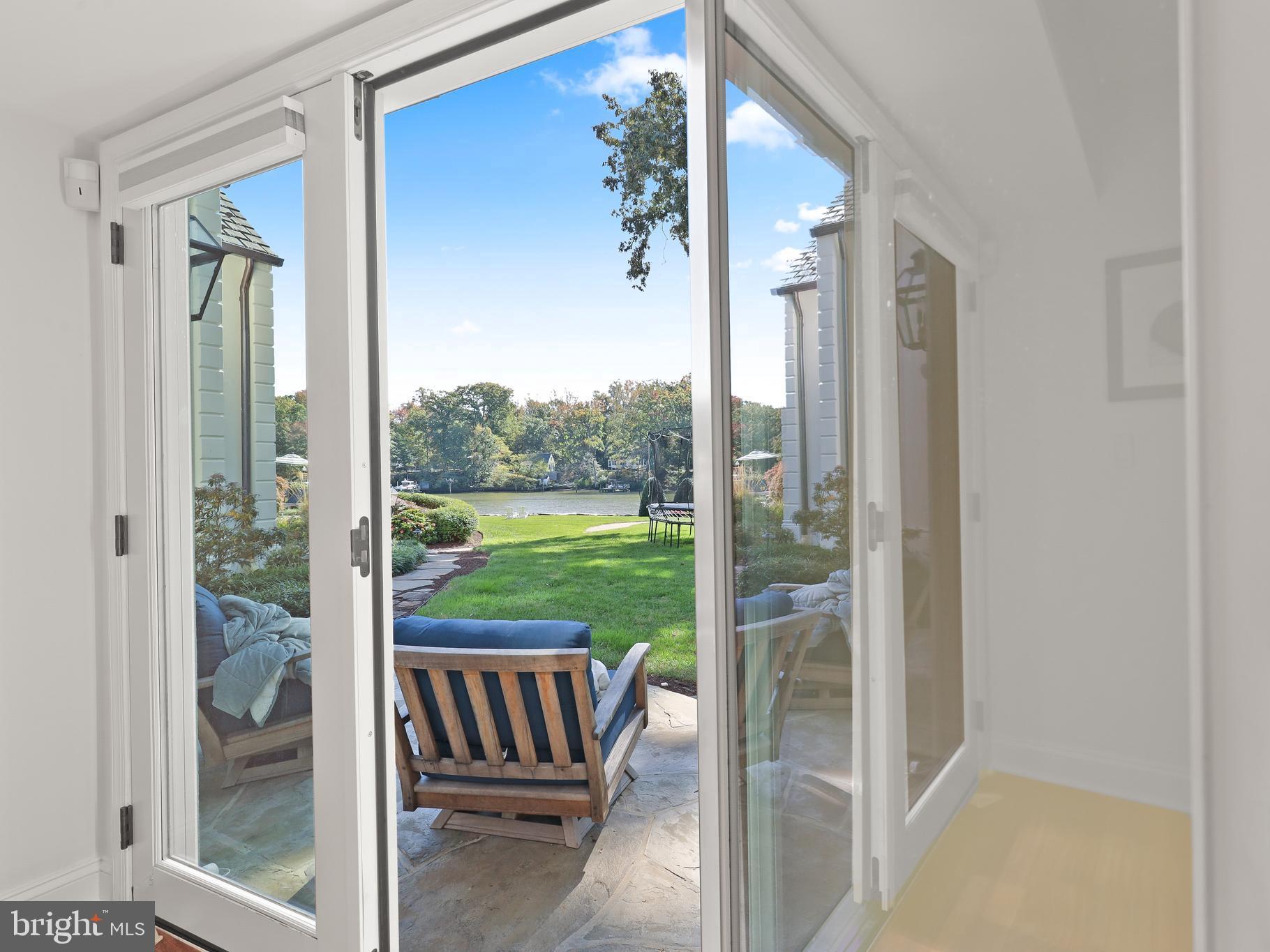 1524 Cedar Lane Farm Road Annapolis, MD 21409 - Photo 34 of 50 a view of a porch with a floor to ceiling window