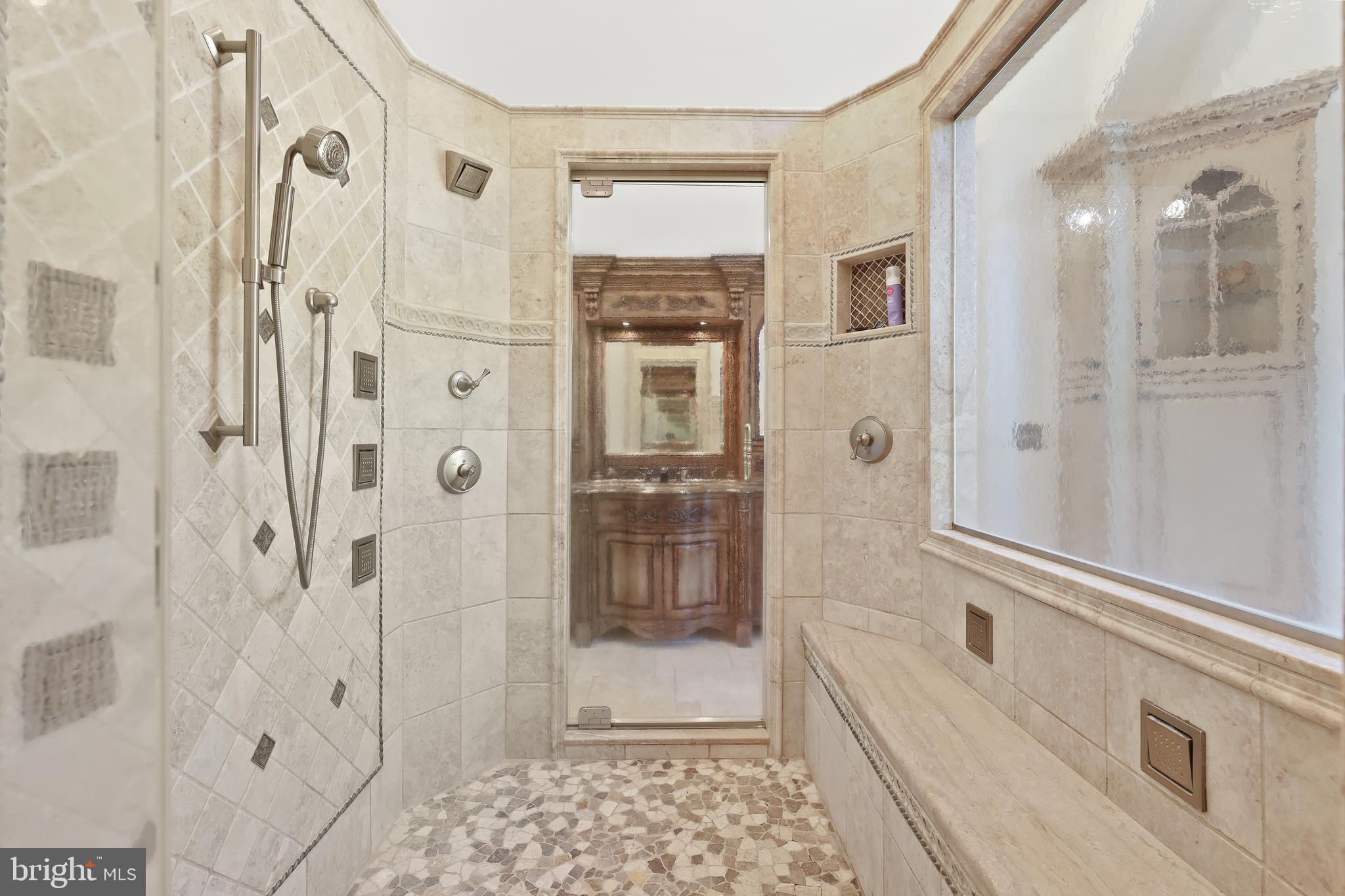 1524 Cedar Lane Farm Road Annapolis, MD 21409 - Photo 40 of 50 a bathroom with a granite countertop shower mirror and a bathtub