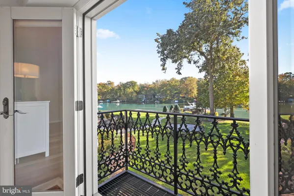 a view of a swimming pool and a yard