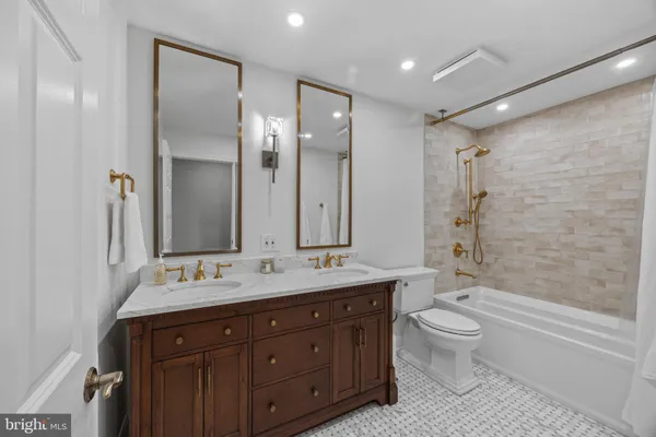 a spacious bedroom with a bed and a large window