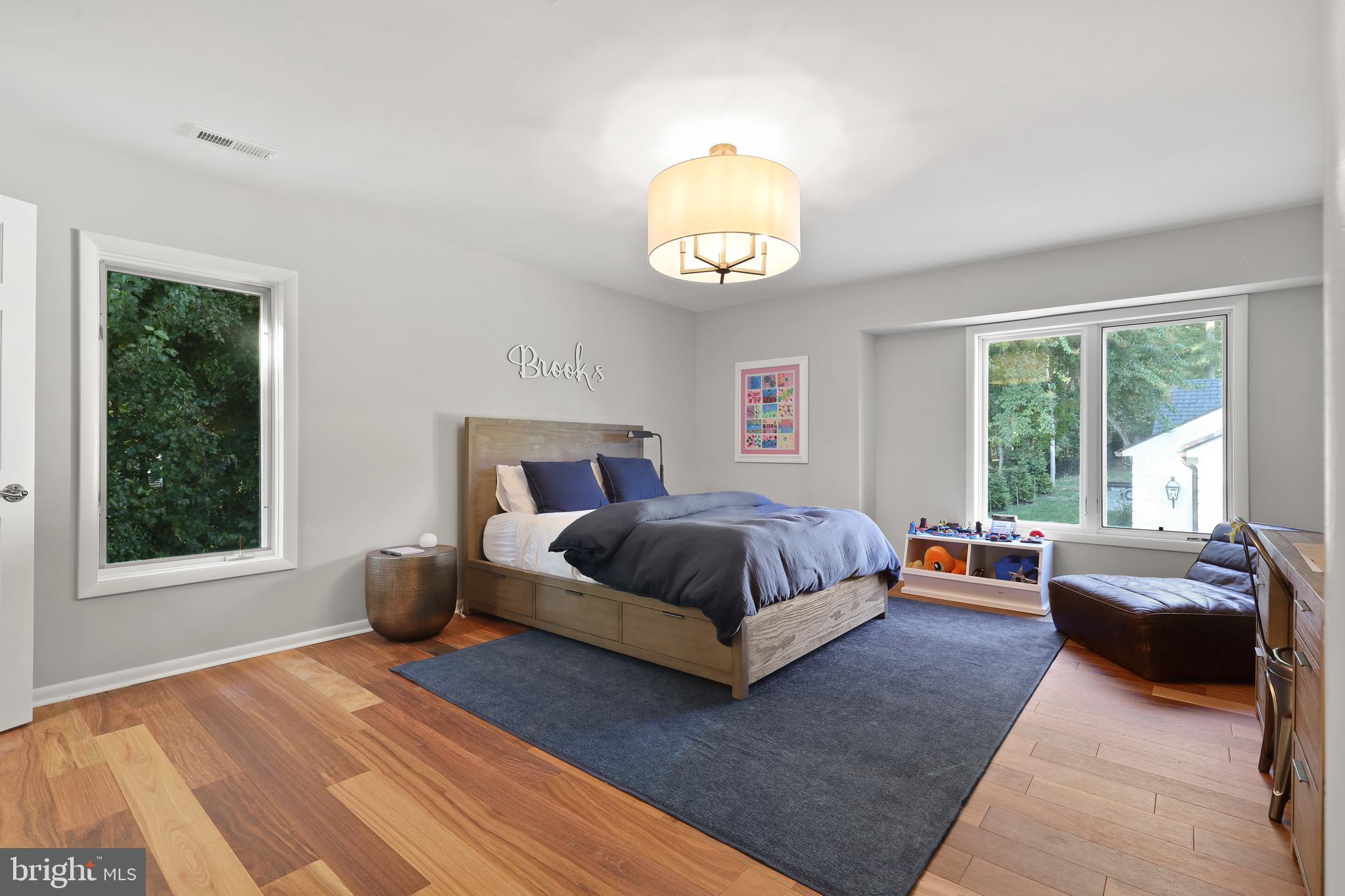 1524 Cedar Lane Farm Road Annapolis, MD 21409 - Photo 49 of 50 a spacious bedroom with a bed and a large window