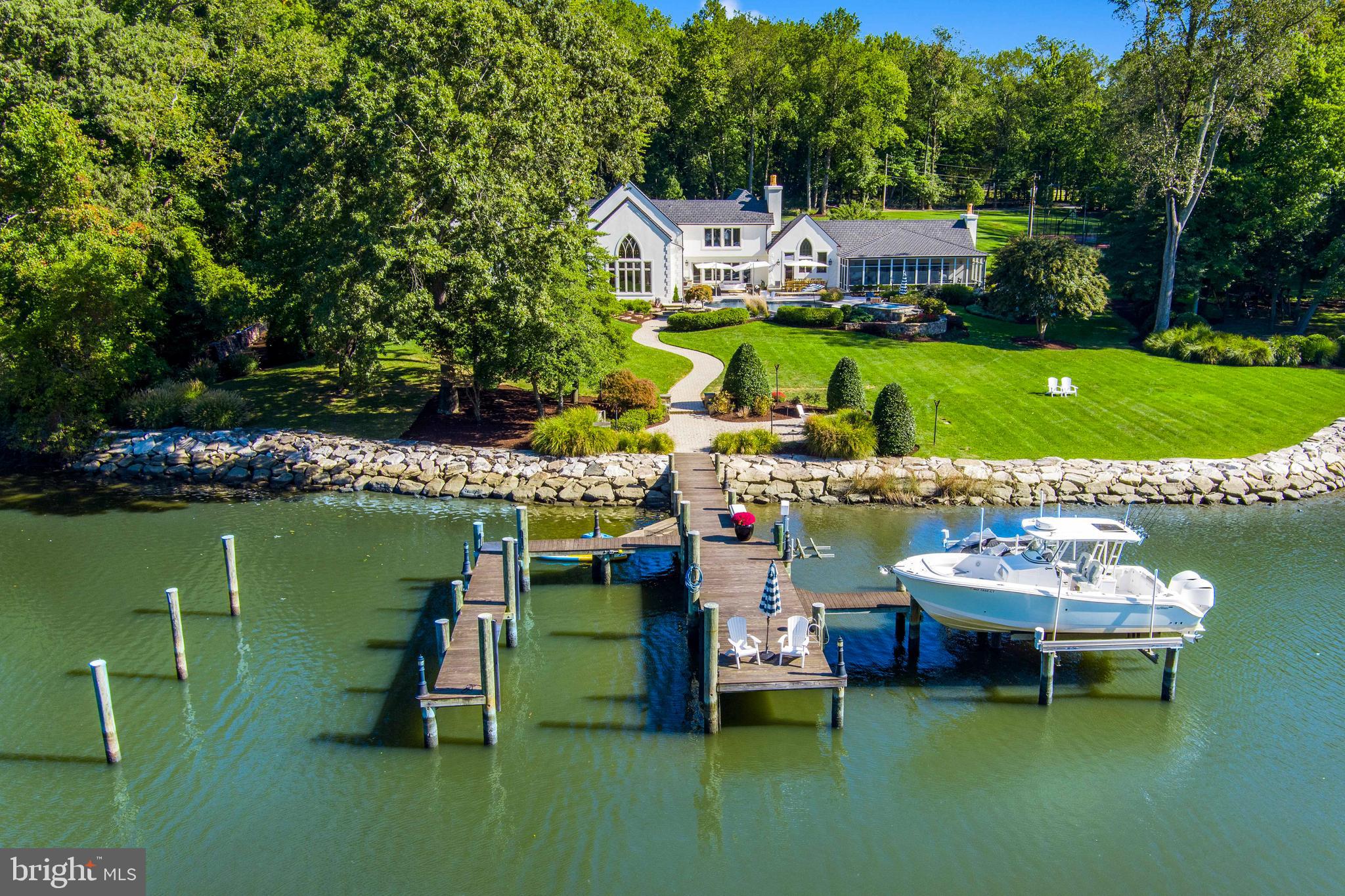 1524 Cedar Lane Farm Road Annapolis, MD 21409 - Photo 5 of 50 a view of a wooden deck and lake view