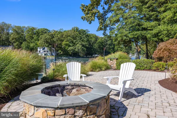 a view of a table and chairs in the patio