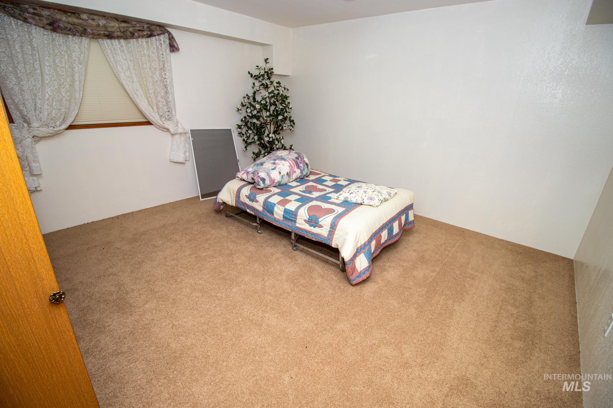 20888 Upper Fords Creek Road Weippe, ID 83553 - Photo 25 of 50 View of carpeted bedroom