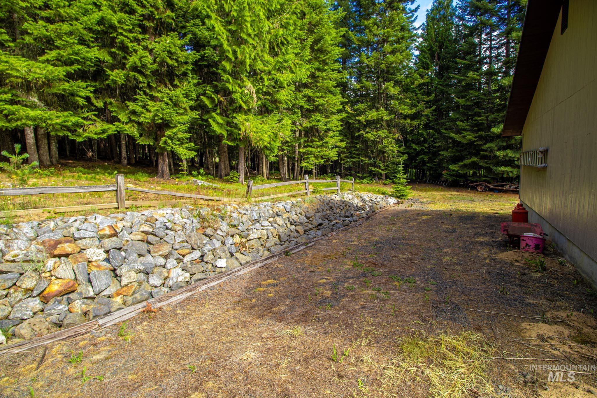 20888 Upper Fords Creek Road Weippe, ID 83553 - Photo 32 of 50 View of yard with view of scattered trees