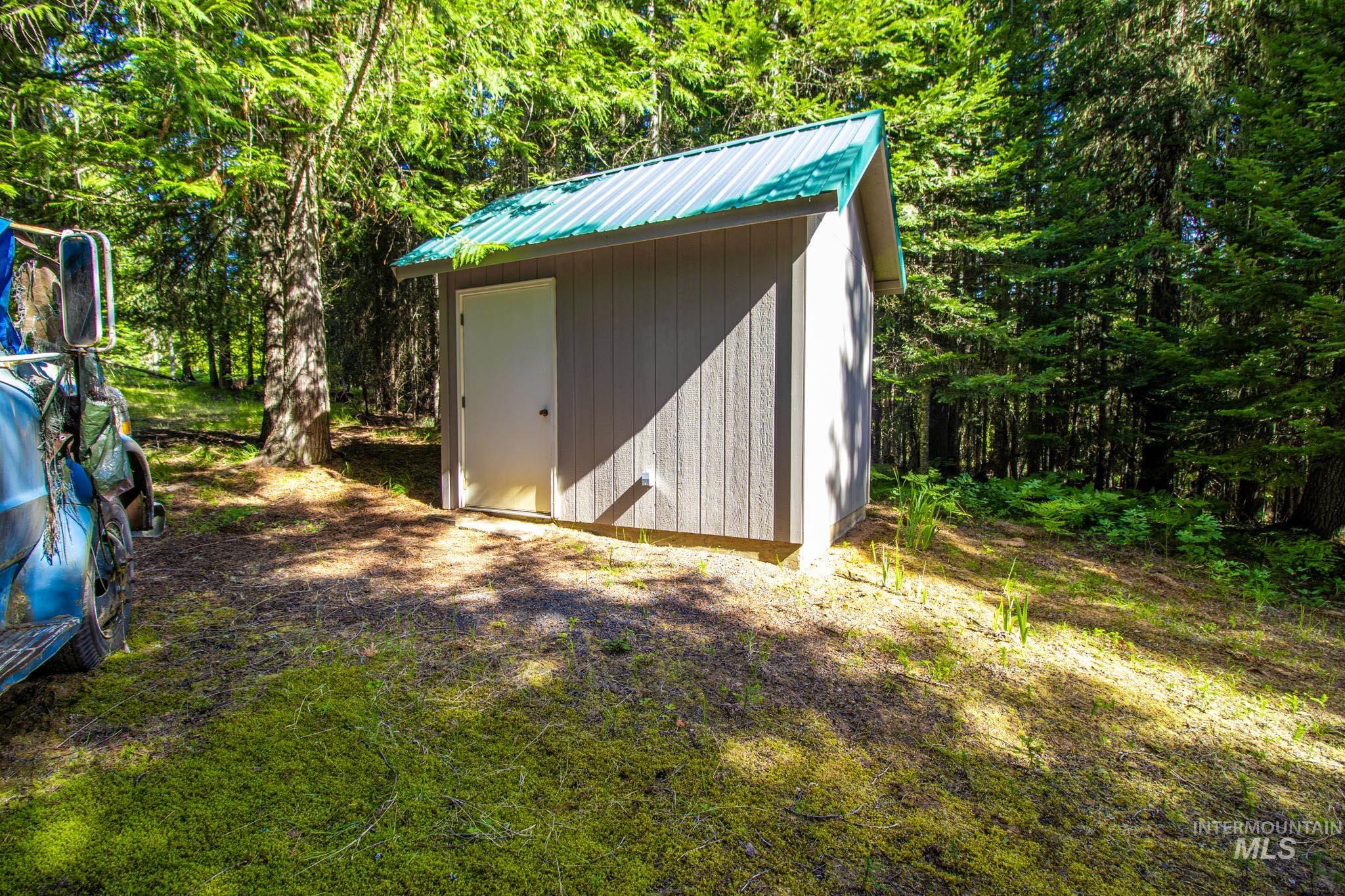 20888 Upper Fords Creek Road Weippe, ID 83553 - Photo 36 of 50 View of shed with view of scattered trees