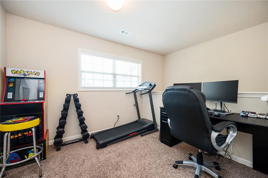 403 Franklin Lane Acworth, GA 30102 - Photo 16 of 26 a view of workspace with windows recliner chair