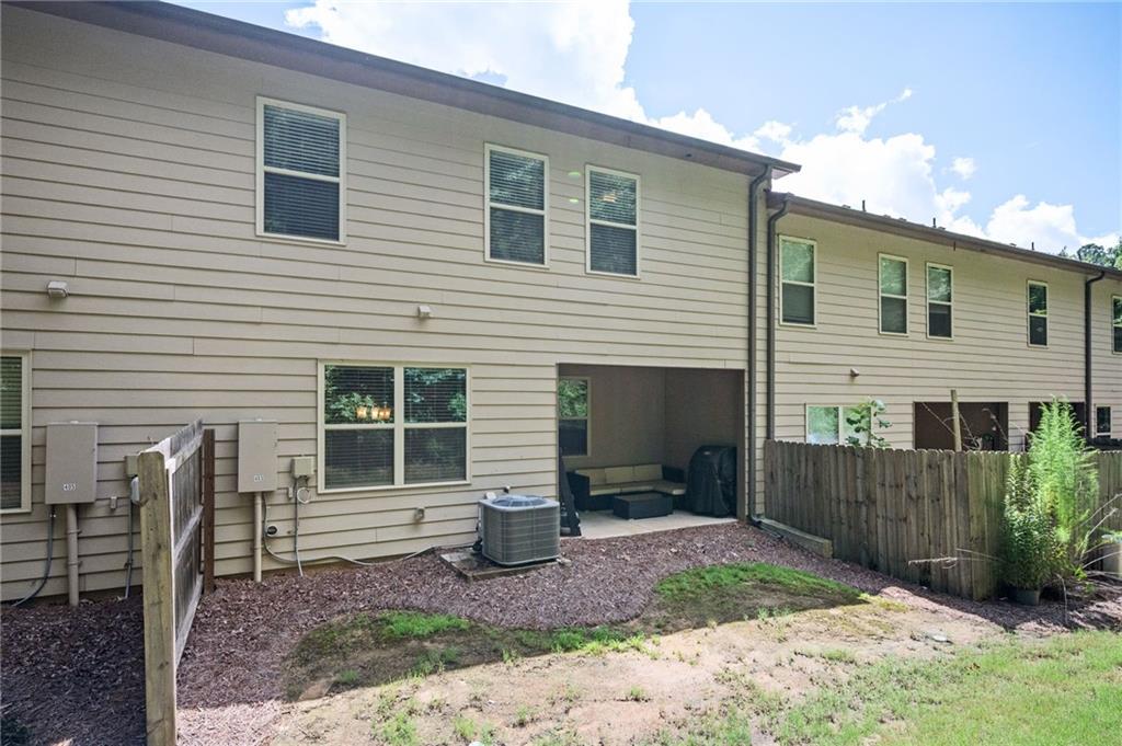 403 Franklin Lane Acworth, GA 30102 - Photo 7 of 26 a view of a house with backyard and chairs