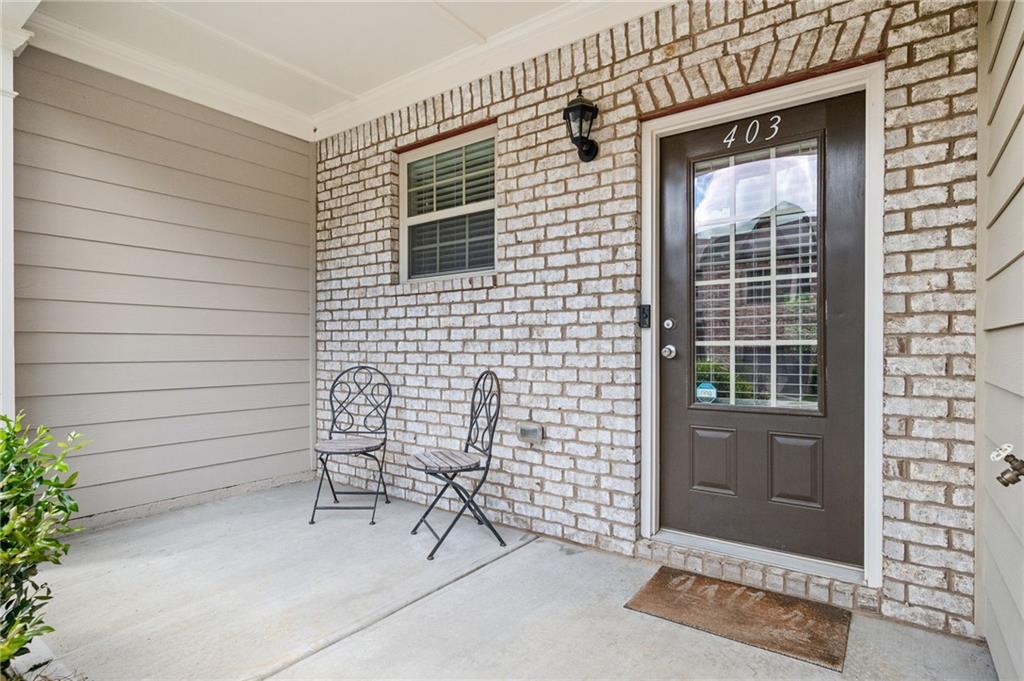 403 Franklin Lane Acworth, GA 30102 - Photo 9 of 26 a view of a house with a door and a chair