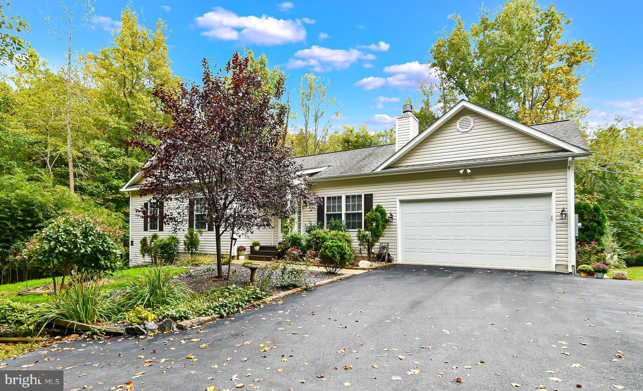 9174 Caledon Road King George, VA 22485 - Photo 1 of 34 Front Exterior with Attached 2-Car Garage