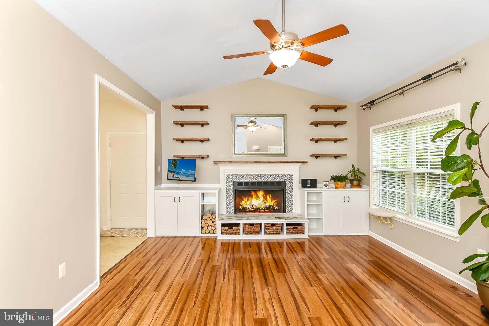 9174 Caledon Road King George, VA 22485 - Photo 6 of 34 Living Room with Vaulted Ceiling & Ceiling Fan