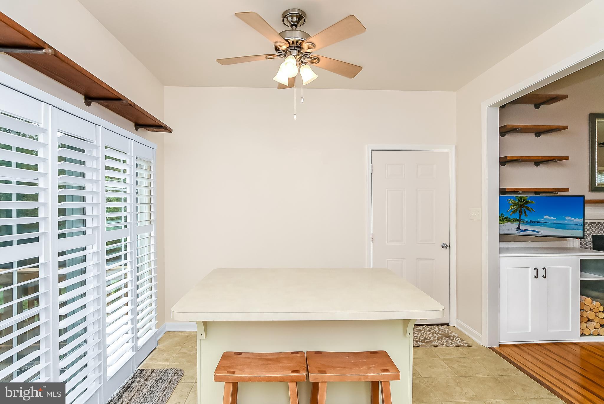 9174 Caledon Road King George, VA 22485 - Photo 9 of 34 Living Room/Dining Area View with Ceiling Fan