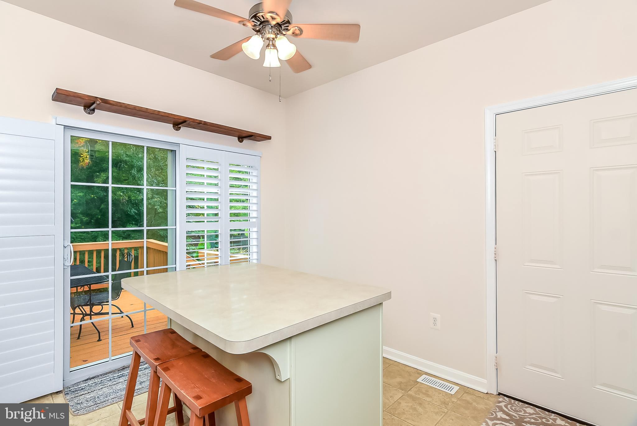 9174 Caledon Road King George, VA 22485 - Photo 10 of 34 Dining Area w/Walk Out to Back Deck & Garage Door