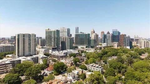 a view of a city with tall buildings