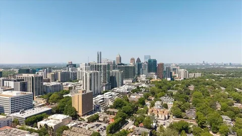 a view of a city with tall buildings