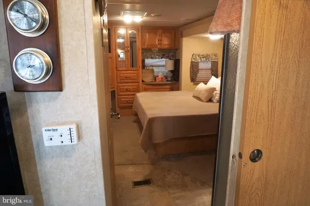 a bathroom with a mirror and a shower