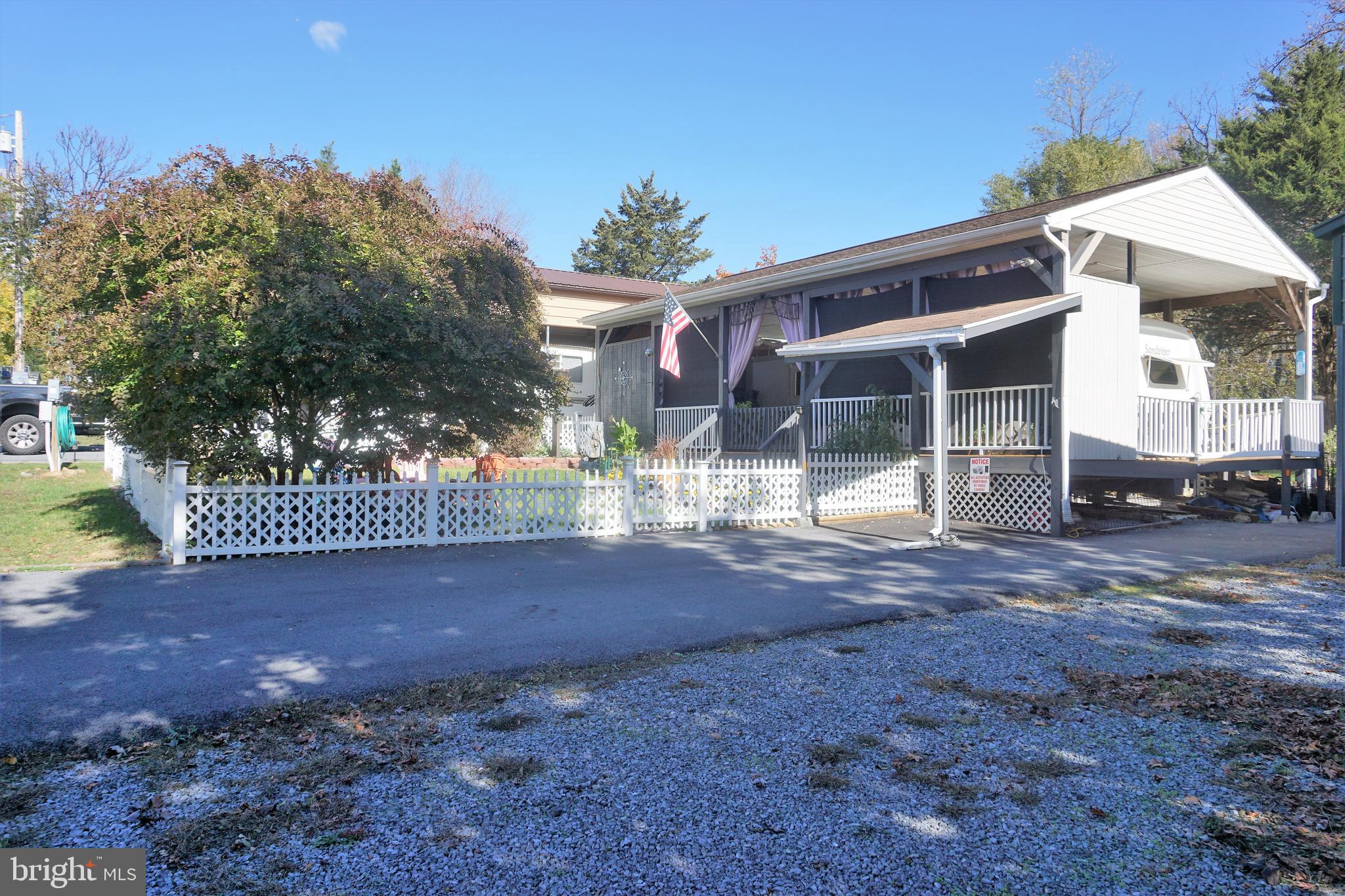69 Block Falling Waters, WV 25419 - Photo 2 of 31 a view of a house with a street