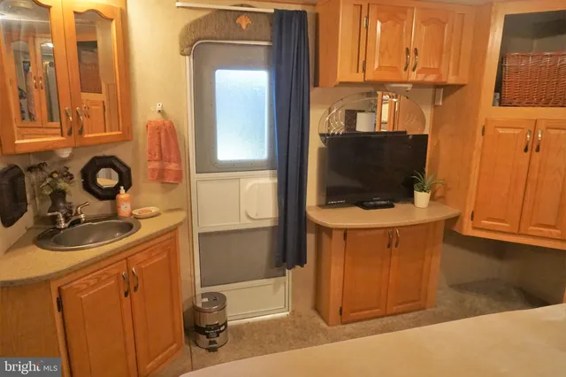 a kitchen with a stove and a microwave