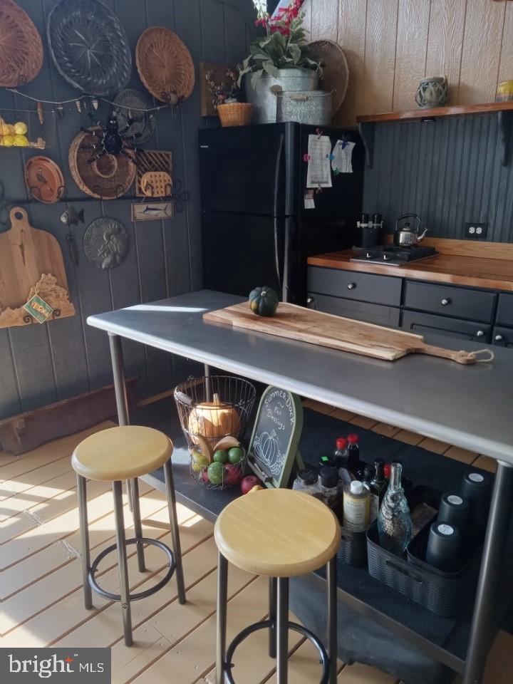 69 Block Falling Waters, WV 25419 - Photo 9 of 34 a dining room with furniture and wooden floor