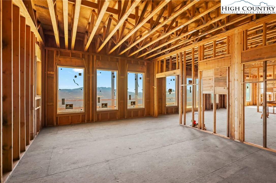 29 Fox Run Road Banner Elk, NC 28604 - Photo 23 of 47 a view of empty room with floor to ceiling windows