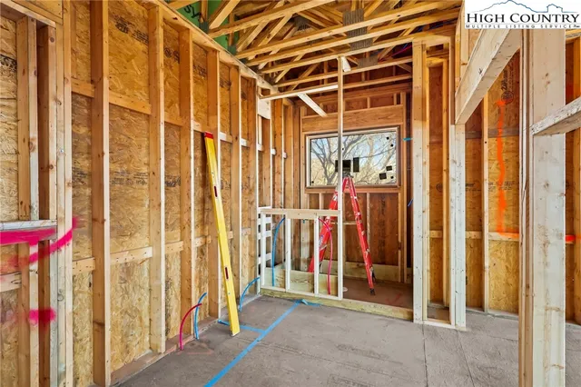a view of a room with wooden walls