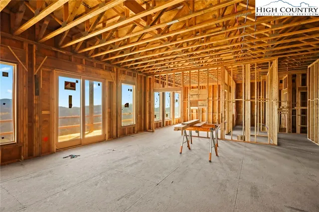 a view of a elevator with wooden floor