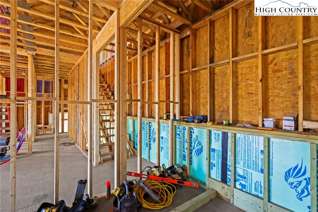 29 Fox Run Road Banner Elk, NC 28604 - Photo 40 of 47 a view of a balcony with chairs and potted plants