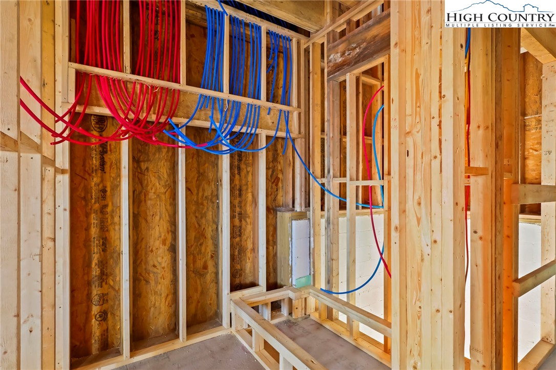 29 Fox Run Road Banner Elk, NC 28604 - Photo 45 of 47 a view of staircase with railing and a window