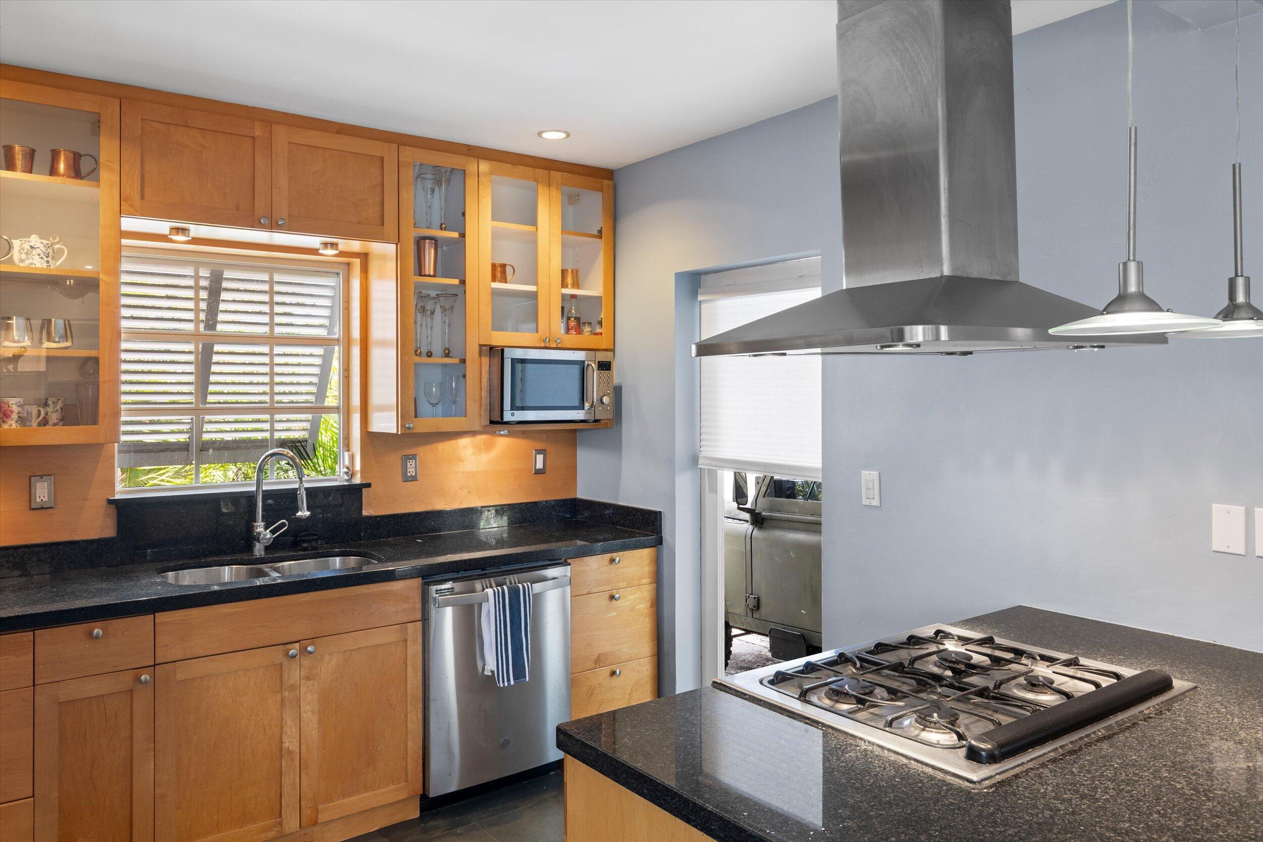1507 19th Street Key West, FL 33040 - Photo 15 of 73 a kitchen with a stove and a granite counter tops