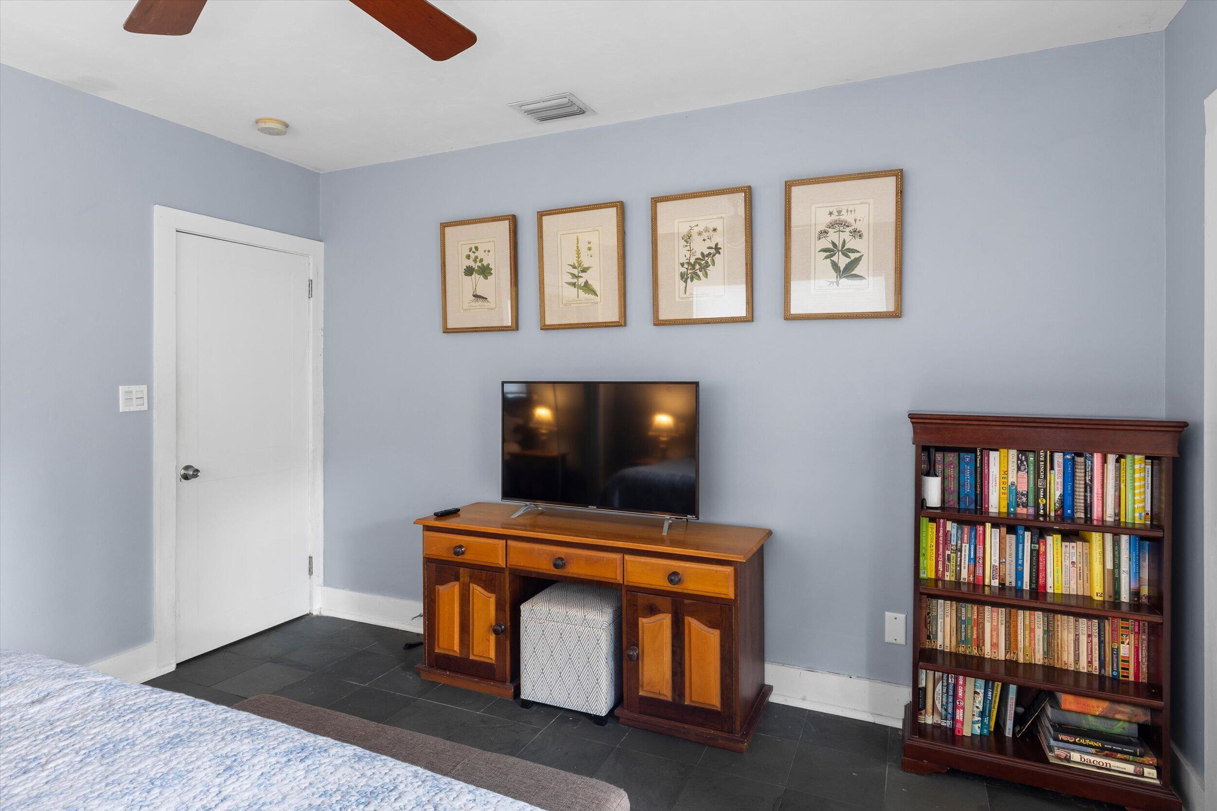 1507 19th Street Key West, FL 33040 - Photo 30 of 73 a living room with furniture and a flat screen tv