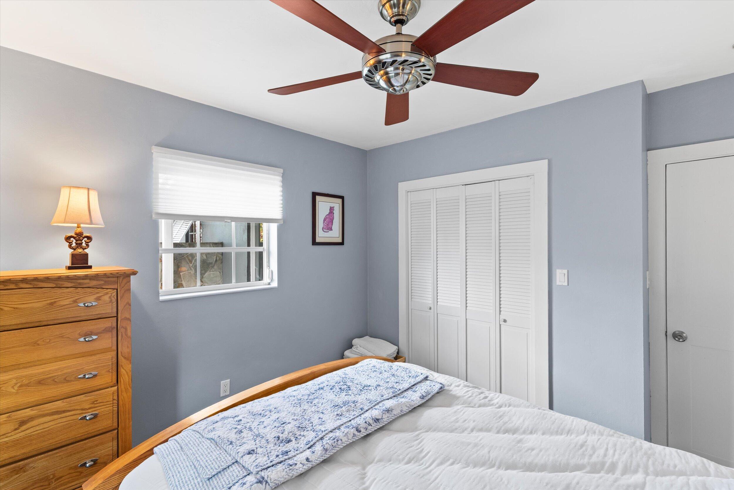 1507 19th Street Key West, FL 33040 - Photo 33 of 73 a bedroom with a bed and a dresser