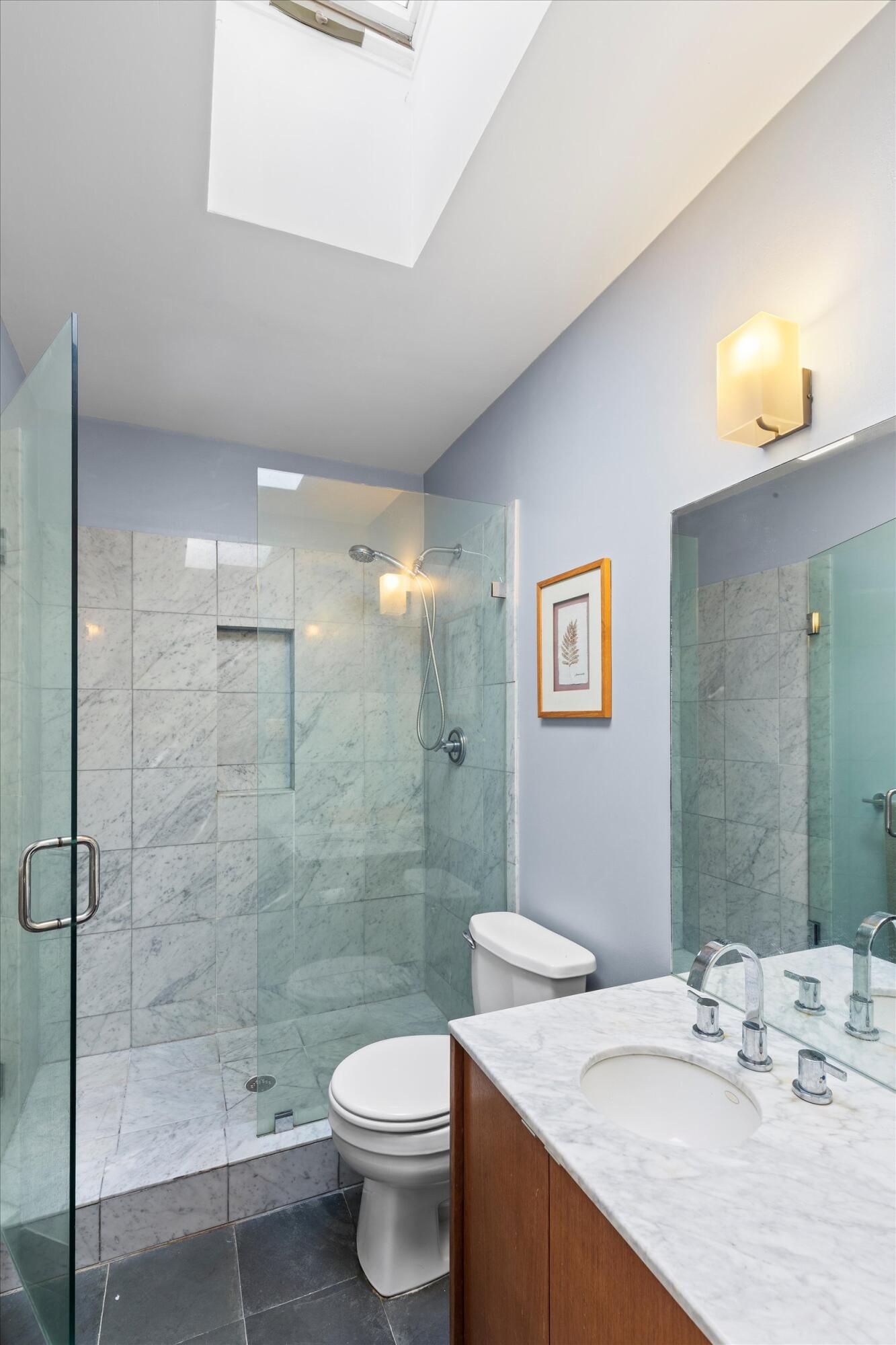 1507 19th Street Key West, FL 33040 - Photo 38 of 73 a bathroom with a sink a toilet and shower