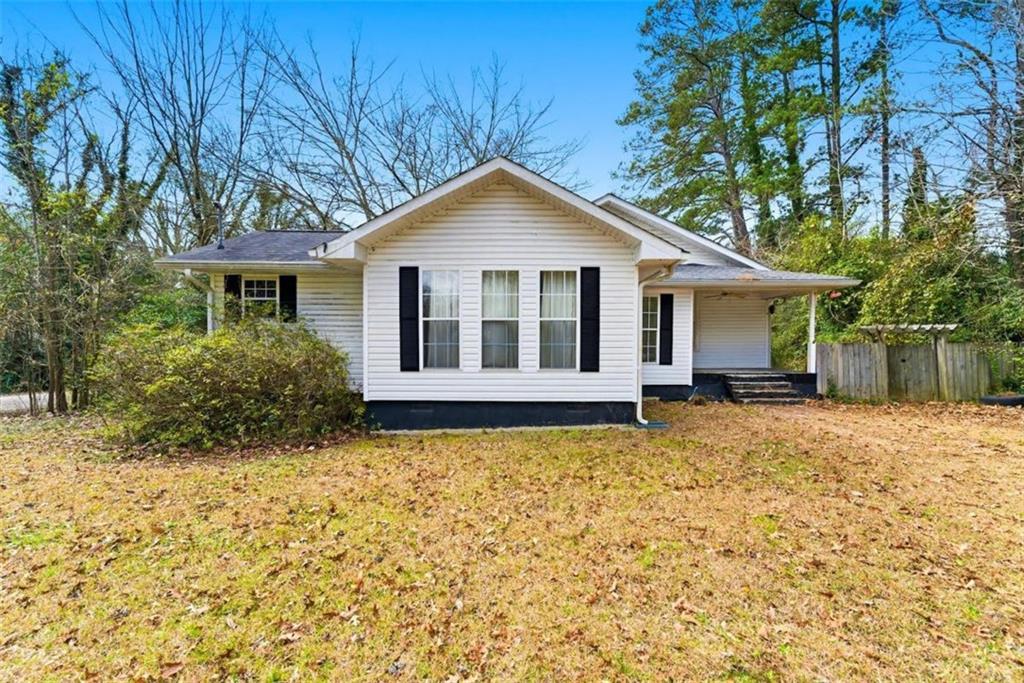 1 Virginia Circle Southwest Rome, GA 30161 - Photo 1 of 1 a house with trees in the background