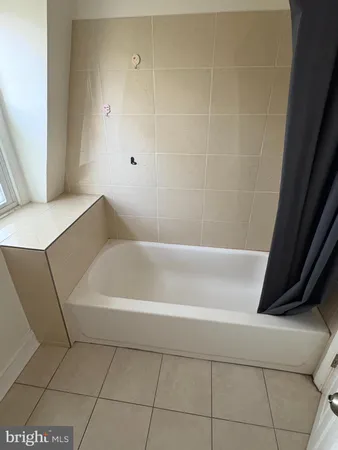 a bathroom with a bathtub