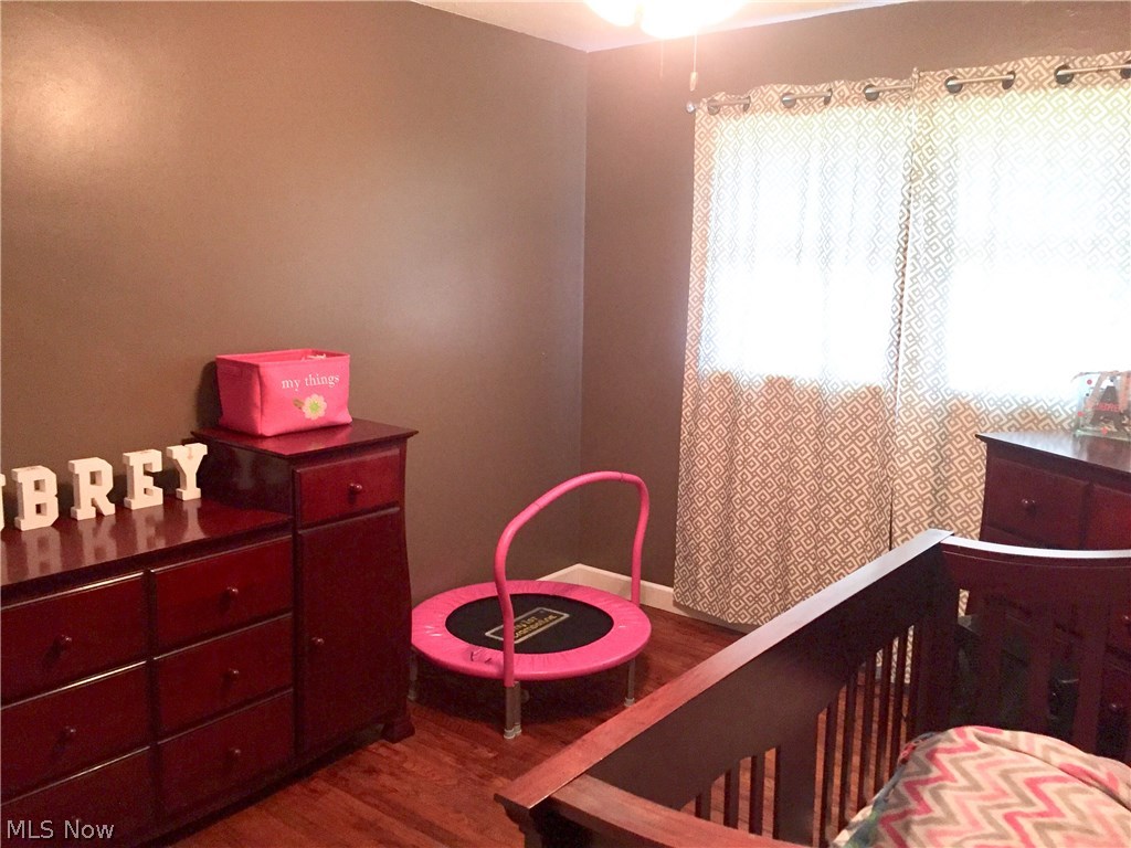 5955 Wynnbrook Road Southwest Canton, OH 44706 - Photo 24 of 26 Bedroom 3 with wood floors