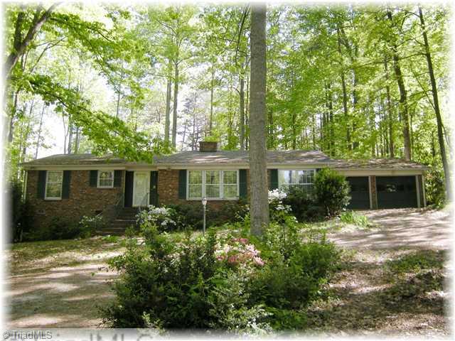 8307 Maloe Court Oak Ridge, NC 27310 - Photo 1 of 8 Exterior Front.